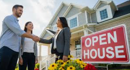 Real estate agent shaking hands with a couple in front of a house with an 'Open House' sign.